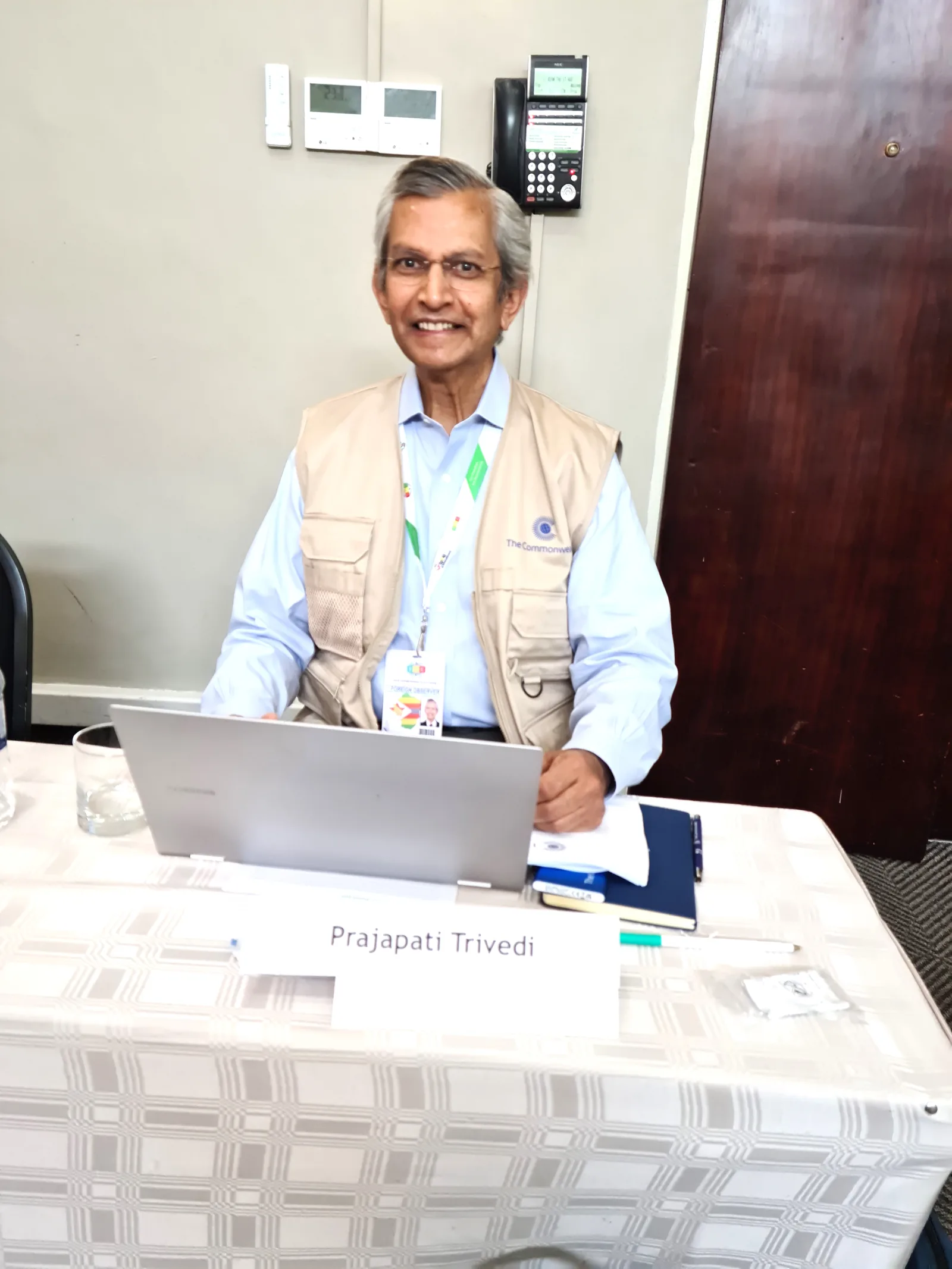 At his desk during a mission briefing session